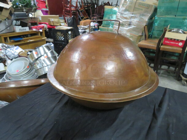 One 16.5 Inch Round Hammered Copper Bowl With Lid. 