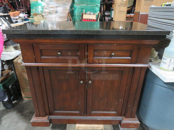 One Wooden Coffee Station With 2 Pass Thru Doors, 1 Shelf And 2 Drawers With A Granite Top. NICE!!!! 43X25X36.5