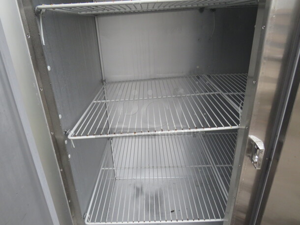 One Stainless Steel Traulsen 3 Door Refrigerator With Racks on Casters. 115 Volt. Model# G30011. 77X35X83.5. $9175.68 - Image 2 of 5