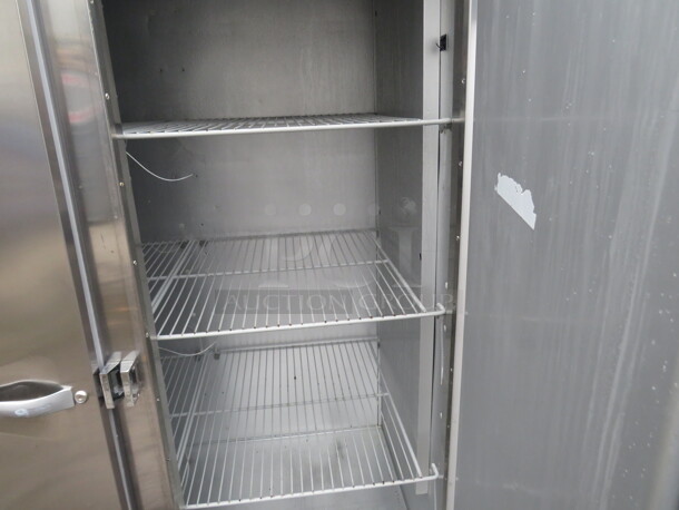 One Stainless Steel Traulsen 3 Door Refrigerator With Racks on Casters. 115 Volt. Model# G30011. 77X35X83.5. $9175.68 - Image 4 of 5