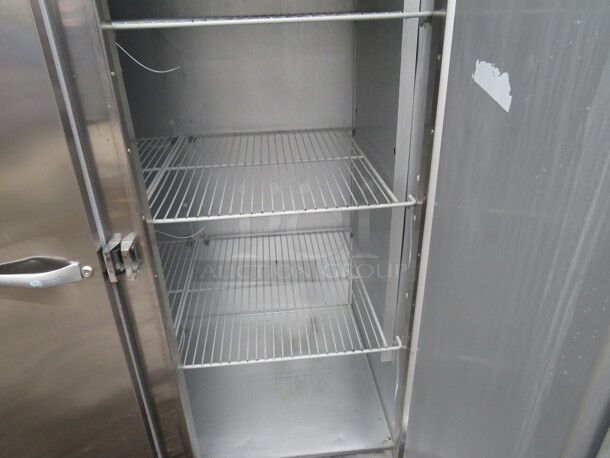 One Stainless Steel Traulsen 3 Door Refrigerator With Racks on Casters. 115 Volt. Model# G30011. 77X35X83.5. $9175.68 - Image 5 of 5