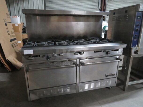 One SS Garland 10 Burner Natural Gas Range, With Over Shelf, On Casters. Model# H284. 60X33X59.
