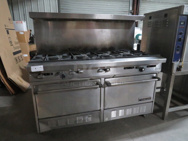 One SS Garland 10 Burner Natural Gas Range, With Over Shelf, On Casters. Model# H284. 60X33X59. - Image 1 of 2