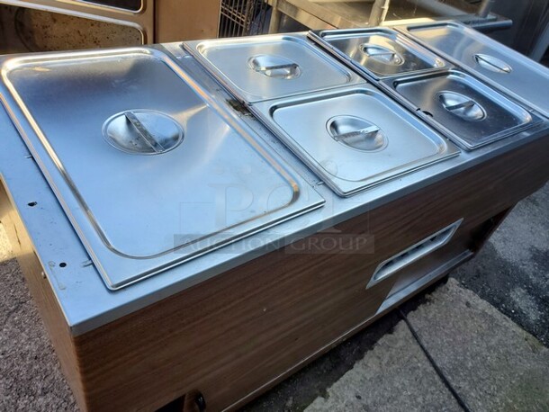 WATERLESS 4 Bay Food Warmer 120Volts
On casters! (Lids not included) - Image 1 of 8