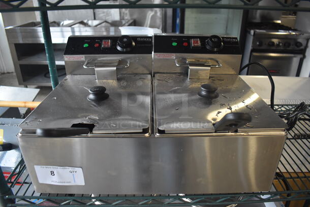 BRAND NEW! Galaxy 177EF20E Stainless Steel Commercial Countertop Electric Powered 2 Bay Fryer w/ 2 Metal Fry Baskets and 2 Lids. 110 Volts, 1 Phase. 22x17x12. Tested and Working!