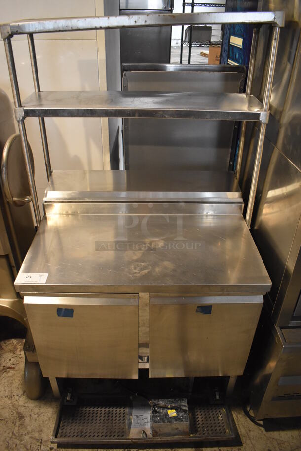 PS200 Stainless Steel Commercial Prep Table w/ 2 Over Shelves. 110 Volts, 1 Phase. 36x29x67. Tested and Does Not Power On