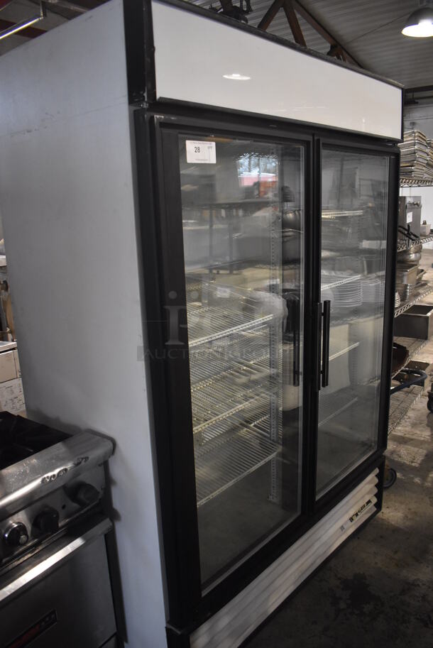 True GDM-49 Metal Commercial 2 Door Reach In Cooler Merchandiser w/ Poly Coated Racks. 115 Volts, 1 Phase. 54x30x79. Tested and Powers On But Does Not Get Cold