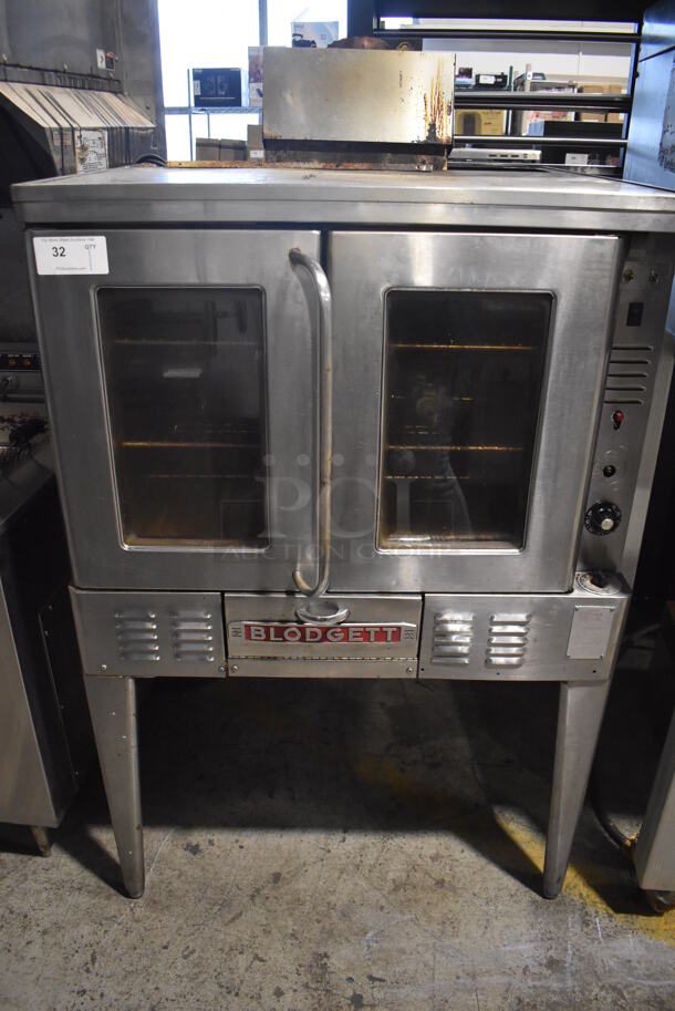 Blodgett FA-100 Stainless Steel Commercial Propane Gas Powered Full Size Convection Oven w/ View Through Doors, Metal Oven Racks and Thermostatic Controls on Metal Legs. 38x38x57