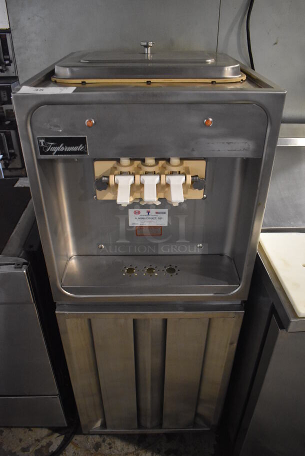 Taylormate Stainless Steel Commercial Air Cooled Floor Style 2 Flavor w/ Twist Soft Serve Ice Cream Machine. 208-240 Volts, 1 Phase. 21x25x53