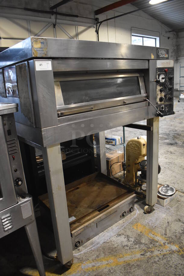 Sveba Dahlen Model DC-12 DD Stainless Steel Commercial Electric Powered Single Deck Oven w/ Metal Legs on Commercial Casters. 208/230 Volts. 54x45x71