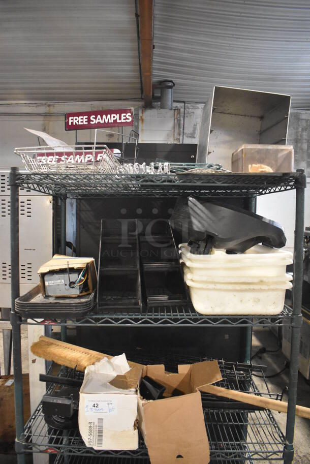 ALL ONE MONEY! Lot of 3 Tiers of Various Items Including metal Baskets, Poly Bins, Robot Coupe Blade Stands and Credit Card Reader Mounts. Shelving Unit Is Not Included