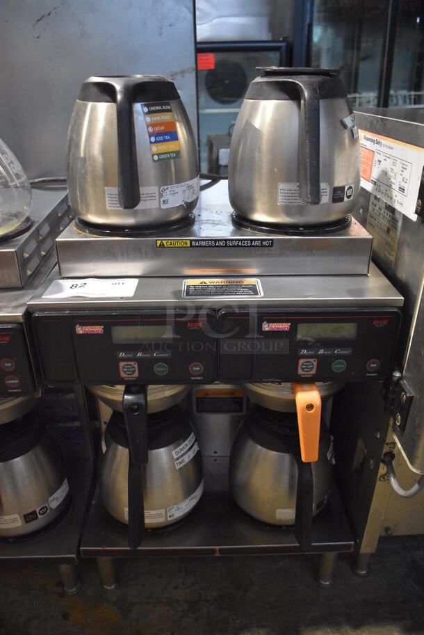 2010 Bunn AXIOM 2/2 TWIN Stainless Steel Commercial Countertop 4 Burner Coffee Machine w/ 2 Metal Brew Baskets and 4 Coffee Pots. 120/208-240 Volts, 1 Phase. 16x18x23