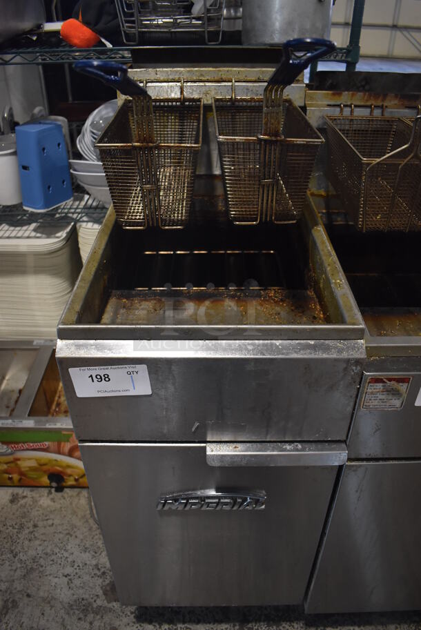 Imperial IFS-50 Stainless Steel Commercial Floor Style Natural Gas Powered Deep Fat Fryer w/ 2 Metal Fry Baskets. 140,000 BTU. 15.5x32x46