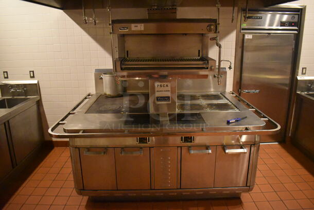 Viking Stainless Steel Commercial Gas Powered Prep Station w/ 4 Burner Charbroiler Style Grill, Oven, 2 Single Induction Burners, 2 Burner Hot Plate Grill, Convection Oven, Salamander Cheese Melter and Waring Mixer. BUYER MUST REMOVE. 87x65x74. Tested and Working! (Demo Kitchen)