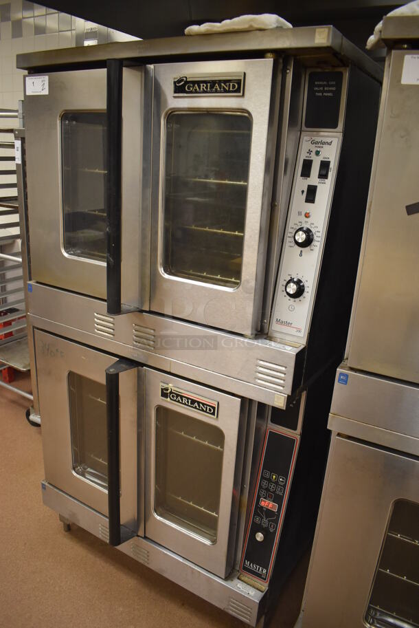 2 Garland Master 200 Stainless Steel Commercial Natural Gas Powered Full Size Convection Ovens w/ View Through Doors, Metal Oven Racks and Thermostatic Controls. BUYER MUST REMOVE. 38x42x71.5. 2 Times Your Bid! Tested and Working! (Pastry Kitchen) - Image 3 of 9