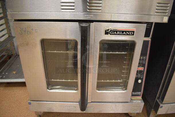 2 Garland Master 200 Stainless Steel Commercial Natural Gas Powered Full Size Convection Ovens w/ View Through Doors, Metal Oven Racks and Thermostatic Controls. BUYER MUST REMOVE. 38x42x71.5. 2 Times Your Bid! Tested and Working! (Pastry Kitchen) - Image 6 of 9