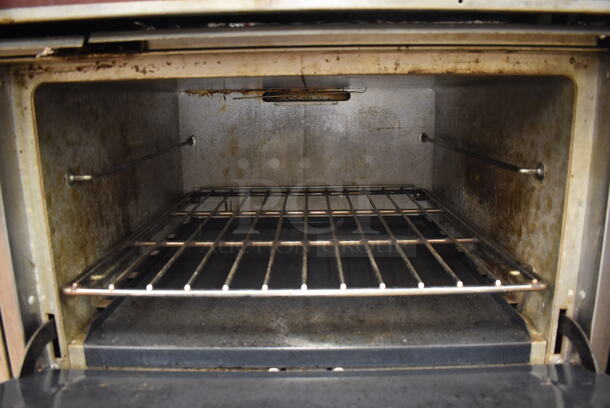 Southbend Stainless Steel Commercial Natural Gas Powered 10 Burner Range w/ 2 Ovens, Over Shelf and Back Splash. Does Not Include Contents. BUYER MUST REMOVE. 61x34x59. Tested and Working! (Restaurant Kitchen) - Image 8 of 8
