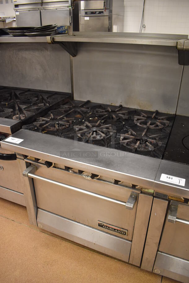 Garland M43R Stainless Steel Commercial Floor Style Natural Gas Powered 2 Burner Range w/ Flat Top, Oven, Over Shelf and Back Splash. BUYER MUST REMOVE. 34x38x58. Tested and Working! (Restaurant Kitchen) - Image 2 of 8