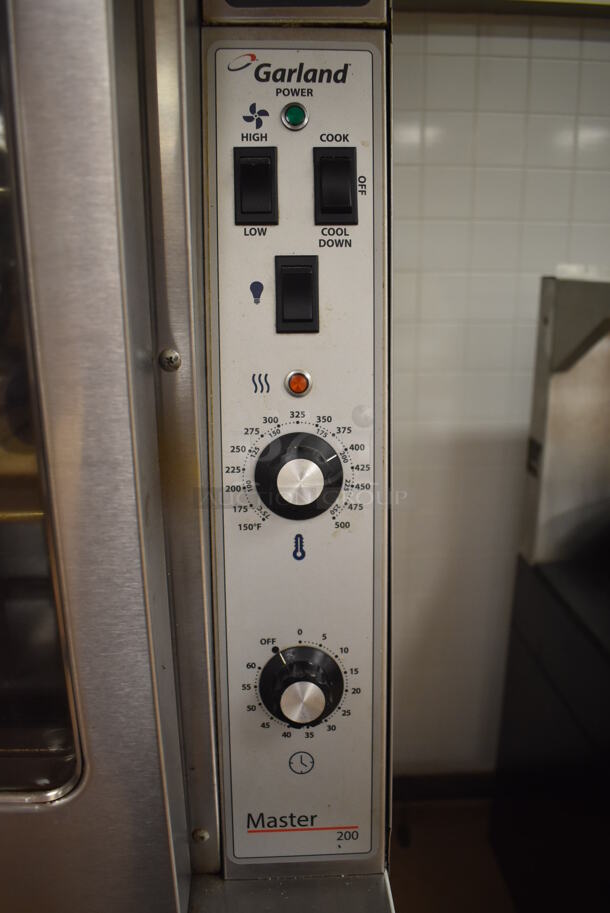 2 Garland Master 200 Stainless Steel Commercial Natural Gas Powered Full Size Convection Ovens w/ View Through Doors, Metal Oven Racks and Thermostatic Controls. BUYER MUST REMOVE. 38x42x71.5. 2 Times Your Bid! Tested and Working! (Pastry Kitchen) - Image 5 of 10