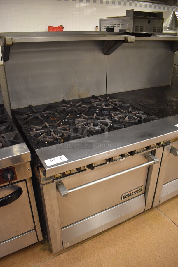 Garland M43R Stainless Steel Commercial Floor Style Natural Gas Powered 2 Burner Range w/ Flat Top, Oven, Over Shelf and Back Splash. BUYER MUST REMOVE. 34x38x58. Tested and Working! (Restaurant Kitchen) - Image 3 of 8