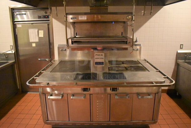 Viking Stainless Steel Commercial Gas Powered Prep Station w/ 4 Burner Charbroiler Style Grill, Oven, 2 Single Induction Burners, 2 Burner Hot Plate Grill, Convection Oven, Salamander Cheese Melter and Waring Mixer. BUYER MUST REMOVE. 87x65x74. Tested and Working! (Demo Kitchen)