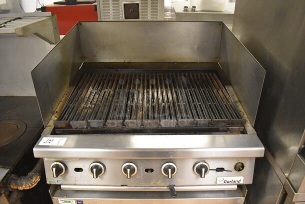 LATE MODEL! Garland Stainless Steel Commercial Countertop Gas Powered Charbroiler Grill w/ Side Splash Guards on Regency Stainless Steel Equipment Stand on Commercial Casters. BUYER MUST REMOVE. 35.5x32x26, 36x30x30. Tested and Working! (Restaurant Kitchen) - Image 2 of 6