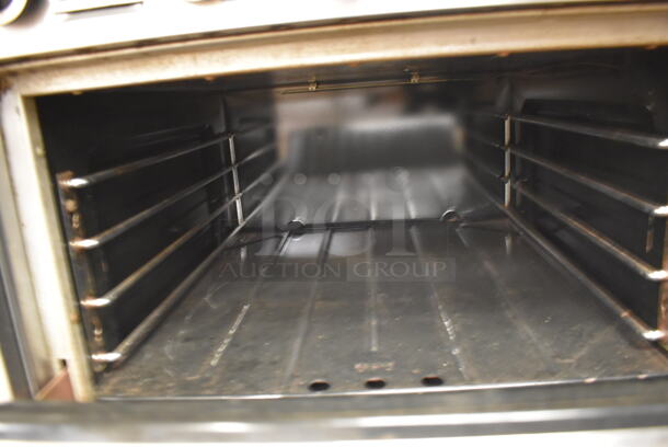 Garland M47R Stainless Steel Commercial Floor Style Natural Gas Powered Flat Top w/ Oven, Over Shelf and Back Splash. BUYER MUST REMOVE. 34x38x58. (Education Kitchen 2) - Image 4 of 7