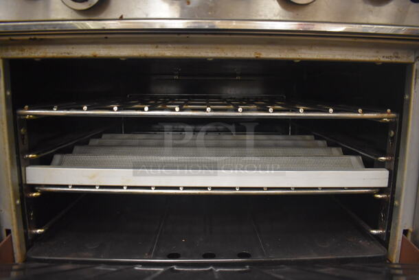 Garland M43R Stainless Steel Commercial Floor Style Natural Gas Powered 2 Burner Range w/ Flat Top, Oven, Over Shelf and Back Splash. BUYER MUST REMOVE. 34x38x58. Tested and Working! (Pastry Kitchen) - Image 6 of 8