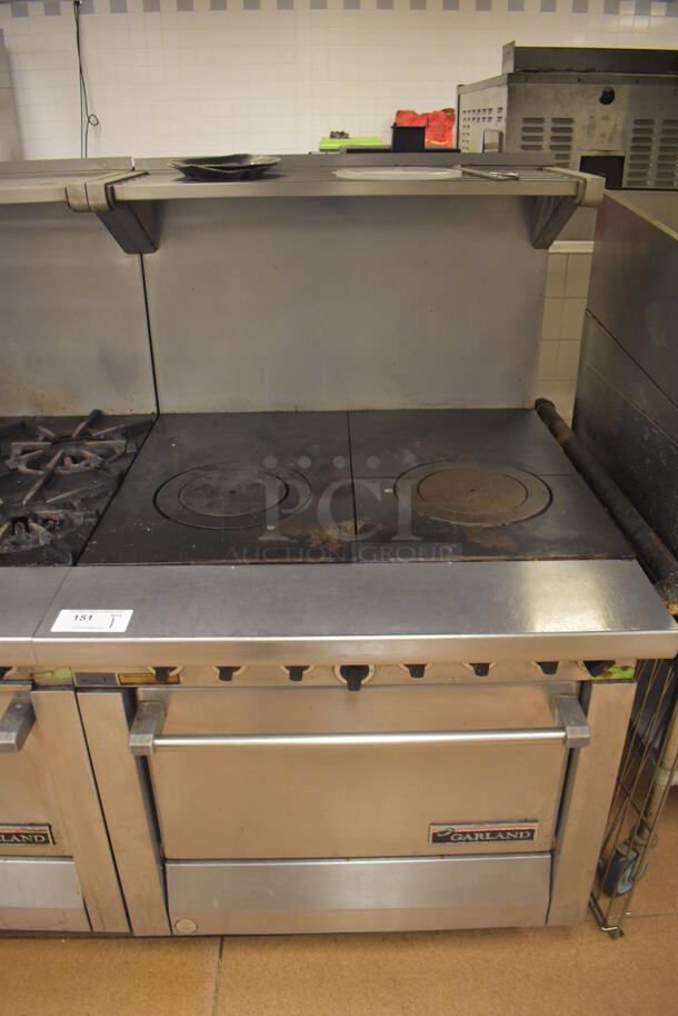Garland M45R Stainless Steel Commercial Floor Style Natural Gas Powered 2 Burner Range w/ Oven, Over Shelf and Back Splash. BUYER MUST REMOVE. 34x38x58. Tested and Working! (Restaurant Kitchen) - Image 1 of 7