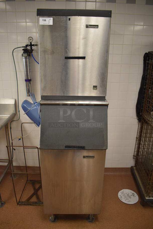 Scotsman Stainless Steel Commercial Ice Head on Scotsman Stainless Steel Ice Bin. BUYER MUST REMOVE. 22x32x78.5. (Restaurant Kitchen)