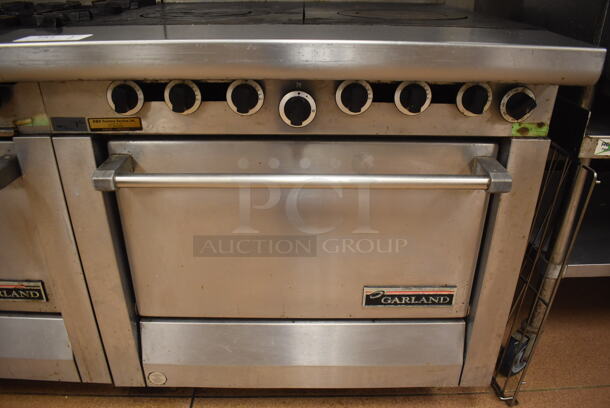 Garland M45R Stainless Steel Commercial Floor Style Natural Gas Powered 2 Burner Range w/ Oven, Over Shelf and Back Splash. BUYER MUST REMOVE. 34x38x58. Tested and Working! (Restaurant Kitchen) - Image 5 of 7