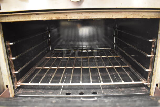 Garland M45R Stainless Steel Commercial Floor Style Natural Gas Powered 2 Burner Range w/ Oven, Over Shelf and Back Splash. BUYER MUST REMOVE. 34x38x58. Tested and Working! (Restaurant Kitchen) - Image 6 of 7