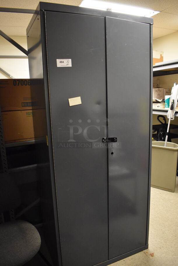 2 Gray Metal 2 Door Cabinets w/ Contents. 36x24x84. 2 Times Your Bid! (Maintenance Room)