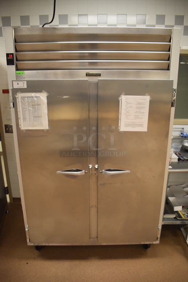 Traulsen G20010 ENERGY STAR Stainless Steel Commercial 2 Door Reach In Cooler w/ Poly Coated Racks on Commercial Casters. Does Not Include Contents. 115 Volts, 1 Phase. 52x35x83.5. Tested and Working! (Pastry Kitchen)