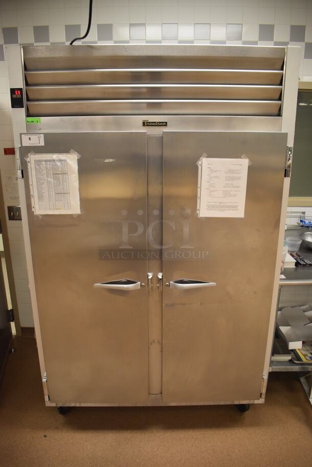 Traulsen G20010 ENERGY STAR Stainless Steel Commercial 2 Door Reach In Cooler w/ Poly Coated Racks on Commercial Casters. Does Not Include Contents. 115 Volts, 1 Phase. 52x35x83.5. Tested and Working! (Pastry Kitchen) - Image 1 of 8