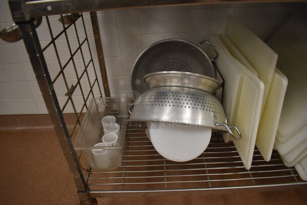 Metal 4 Tier Wire Shelving Unit w/ Contents Including Utensils, Poly Drop In Bins and Cutting Boards on Commercial Casters. BUYER MUST DISMANTLE. PCI CANNOT DISMANTLE FOR SHIPPING. PLEASE CONSIDER FREIGHT CHARGES. 60x24x78. (Restaurant Kitchen) - Image 9 of 10