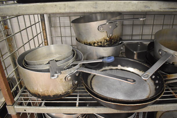 Metal 4 Tier Wire Shelving Unit w/ Contents Including Metal Baking Pans, Drop In Bins and Skillets on Commercial Casters. BUYER MUST DISMANTLE. PCI CANNOT DISMANTLE FOR SHIPPING. PLEASE CONSIDER FREIGHT CHARGES. 48x24x70. (Restaurant Kitchen) - Image 8 of 11