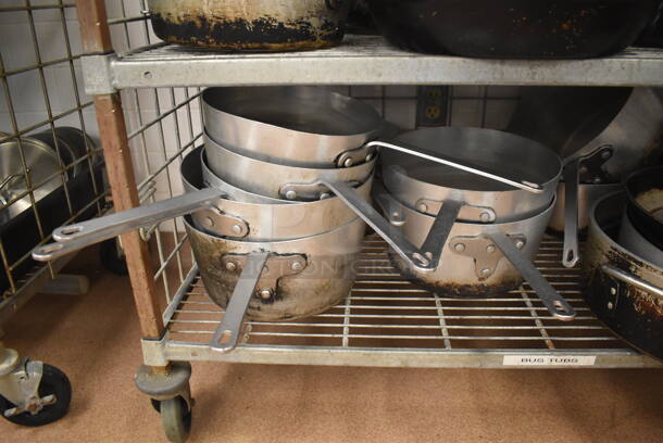 Metal 4 Tier Wire Shelving Unit w/ Contents Including Metal Baking Pans, Drop In Bins and Skillets on Commercial Casters. BUYER MUST DISMANTLE. PCI CANNOT DISMANTLE FOR SHIPPING. PLEASE CONSIDER FREIGHT CHARGES. 48x24x70. (Restaurant Kitchen) - Image 11 of 11