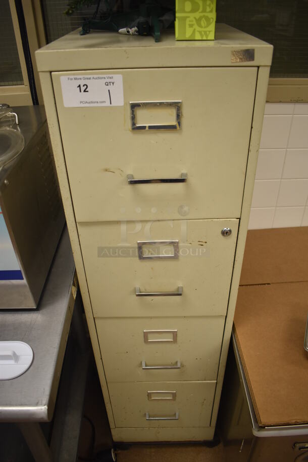 Tan Metal 4 Drawer Filing Cabinet on Commercial Casters. 15x19x54.5. (Pastry Kitchen)