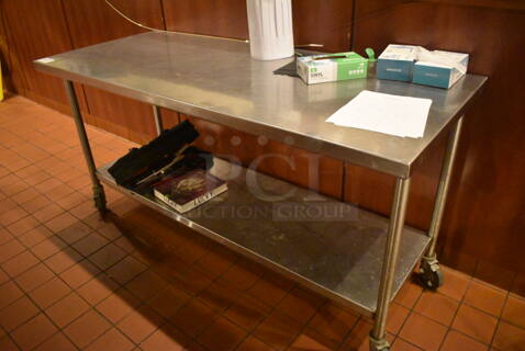 Stainless Steel Table w/ Stainless Steel Under Shelf on Commercial Casters. Does Not Include Contents. 72x30x36. (Demo Kitchen)