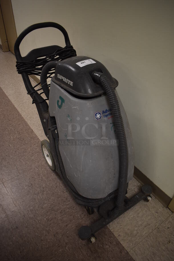 Nilfisk Advance Sprite 16 Metal Commercial Floor Cleaner. 26x42x40.5. (Maintenance Room)