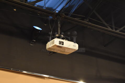 Epson Ceiling Mounted Projector and Pull Down Projection Screen. BUYER MUST REMOVE. 11x8x4, 94". (Demo Kitchen)