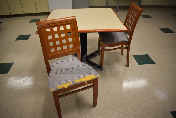 Square Dining Table on Black Metal Table Base w/ 2 Wood Pattern Dining Chairs. 42x42x30, 19x17x36. (Student Lounge)