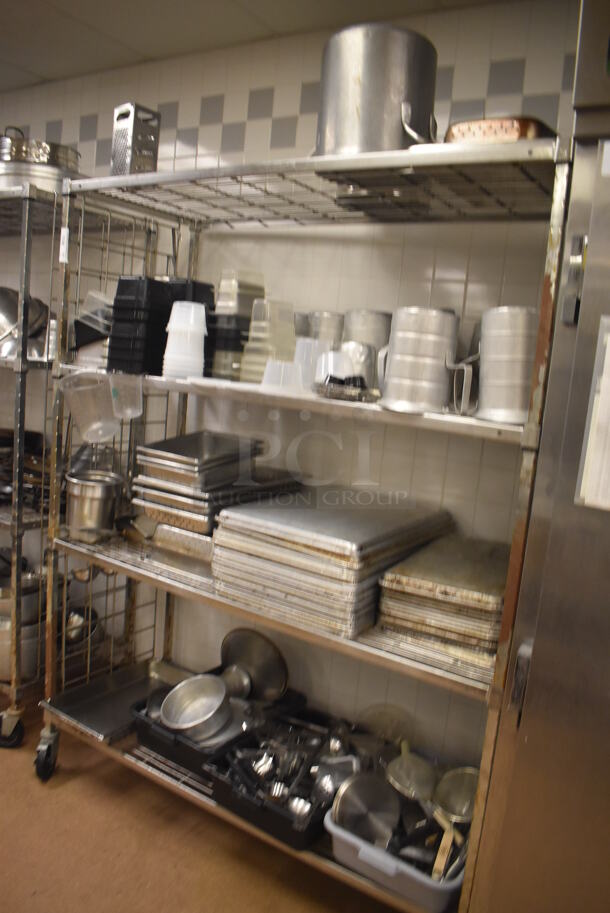 Metal 4 Tier Wire Shelving Unit on Commercial Casters w/ Contents Including Stainless Steel Drop In Bins, Metal Pitchers and Utensils. BUYER MUST DISMANTLE. PCI CANNOT DISMANTLE FOR SHIPPING. PLEASE CONSIDER FREIGHT CHARGES. 60x24x78. (Education Kitchen 2) - Image 2 of 10