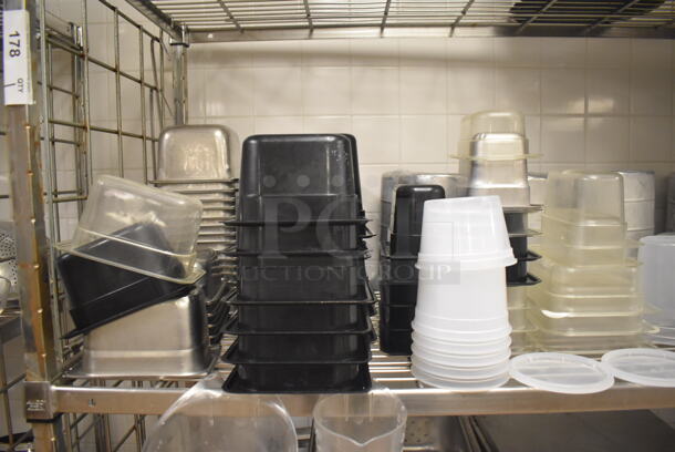 Metal 4 Tier Wire Shelving Unit on Commercial Casters w/ Contents Including Stainless Steel Drop In Bins, Metal Pitchers and Utensils. BUYER MUST DISMANTLE. PCI CANNOT DISMANTLE FOR SHIPPING. PLEASE CONSIDER FREIGHT CHARGES. 60x24x78. (Education Kitchen 2) - Image 5 of 10