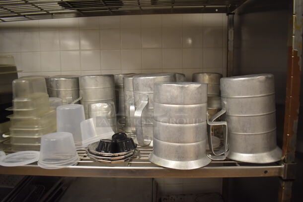 Metal 4 Tier Wire Shelving Unit on Commercial Casters w/ Contents Including Stainless Steel Drop In Bins, Metal Pitchers and Utensils. BUYER MUST DISMANTLE. PCI CANNOT DISMANTLE FOR SHIPPING. PLEASE CONSIDER FREIGHT CHARGES. 60x24x78. (Education Kitchen 2) - Image 6 of 10