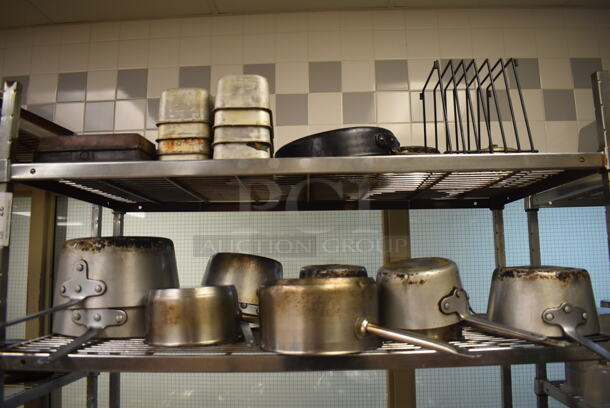 Metal 5 Tier Wire Shelving Unit w/ Contents Including Sauce Pots, Metal Bowls, Muffin Baking Pans, Rolling Pins and Metal Pans. BUYER MUST DISMANTLE. PCI CANNOT DISMANTLE FOR SHIPPING. PLEASE CONSIDER FREIGHT CHARGES. 48x24x84. (Pastry Kitchen) - Image 3 of 6