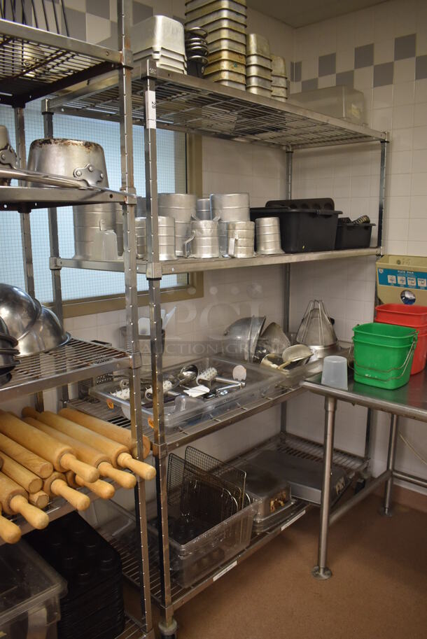 Metal 4 Tier Wire Shelving Unit on Commercial Casters w/ Contents Including Metal Pans, Metal Pitchers, Utensils and Drop In Bins. BUYER MUST DISMANTLE. PCI CANNOT DISMANTLE FOR SHIPPING. PLEASE CONSIDER FREIGHT CHARGES. 60x24x78. (Pastry Kitchen)