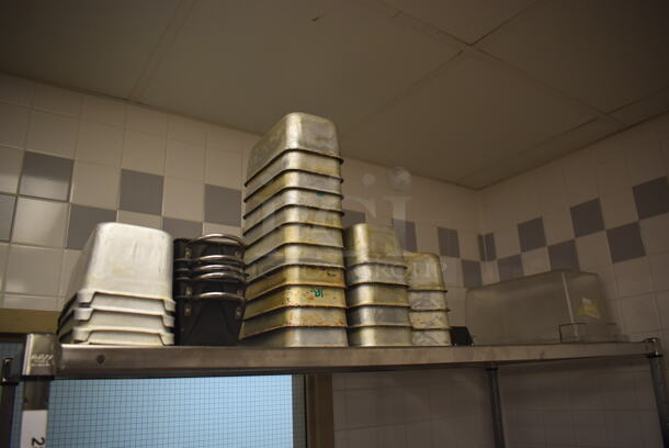 Metal 4 Tier Wire Shelving Unit on Commercial Casters w/ Contents Including Metal Pans, Metal Pitchers, Utensils and Drop In Bins. BUYER MUST DISMANTLE. PCI CANNOT DISMANTLE FOR SHIPPING. PLEASE CONSIDER FREIGHT CHARGES. 60x24x78. (Pastry Kitchen) - Image 2 of 7