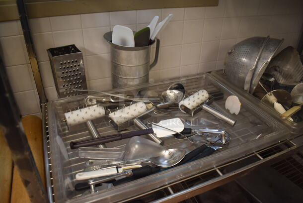 Metal 4 Tier Wire Shelving Unit on Commercial Casters w/ Contents Including Metal Pans, Metal Pitchers, Utensils and Drop In Bins. BUYER MUST DISMANTLE. PCI CANNOT DISMANTLE FOR SHIPPING. PLEASE CONSIDER FREIGHT CHARGES. 60x24x78. (Pastry Kitchen) - Image 4 of 7